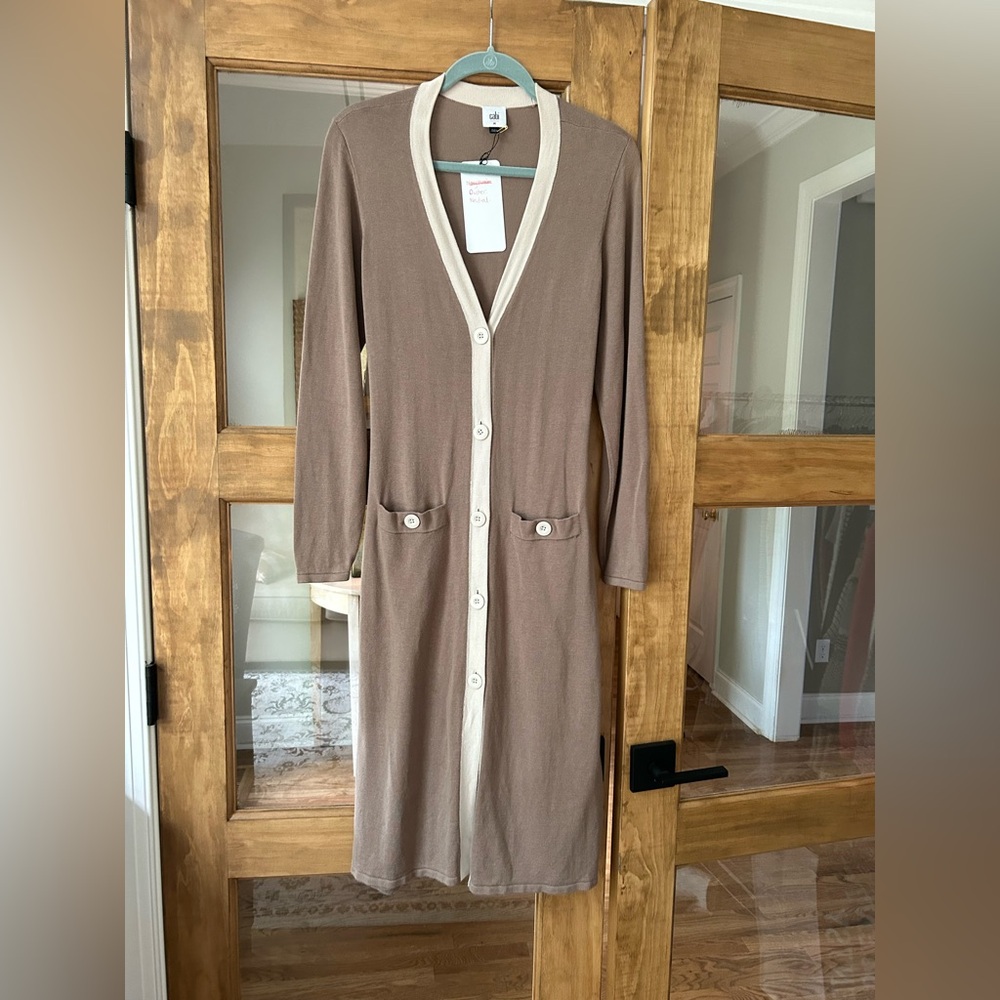 Long length cardigan with belt. Neutral tan with cream edging. Size M EUC. Cabi